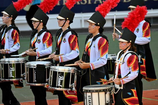 A band parades ahead of the inauguration ceremony of Costa Rica's President-elect Laura Fernandez, at the National Stadium, in San Jose, on May 8, 2026. (Photo by MARTIN BERNETTI / AFP)