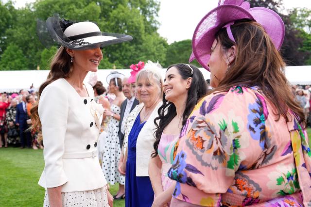 Britain's Catherine, Princess of Wales talks to guests during a Royal Garden Party at Buckingham Palace, in London, on May 8, 2026. (Photo by Aaron Chown / POOL / AFP)