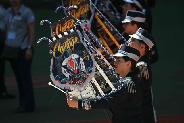 A band parades ahead of the inauguration ceremony of Costa Rica's President-elect Laura Fernandez, at the National Stadium, in San Jose, on May 8, 2026. (Photo by MARTIN BERNETTI / AFP)
