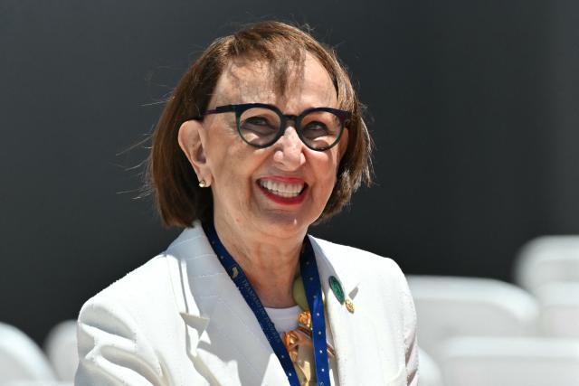 Secretary-General of UN Trade and Development (UNCTAD), Costa Rican economist Rebeca Grynspan, smiles as she arrives for the inauguration ceremony of Costa Rica's president-elect Laura Fernandez at the National Stadium in San Jose on May 8, 2026. (Photo by MARTIN BERNETTI / AFP)