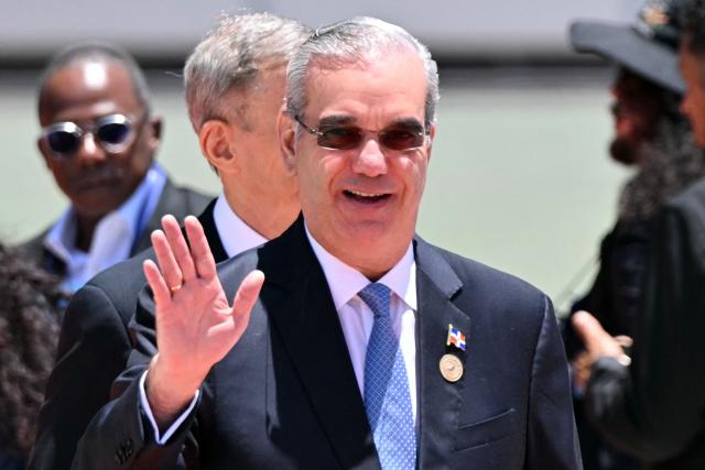 Dominican Republic's President Luis Abinader waves as he arrives for the inauguration ceremony of Costa Rica's president-elect Laura Fernandez, in San Jose, on May 8, 2026. (Photo by MARTIN BERNETTI / AFP)