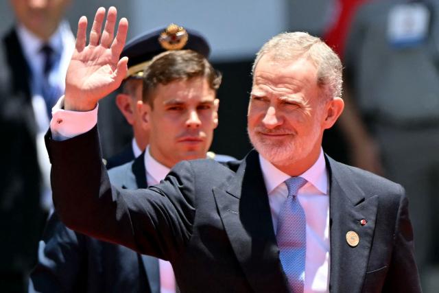 Spain's King Felipe VI waves as he arrives for the inauguration ceremony of Costa Rica's president-elect Laura Fernandez at the National Stadium in San Jose on May 8, 2026. (Photo by MARTIN BERNETTI / AFP)