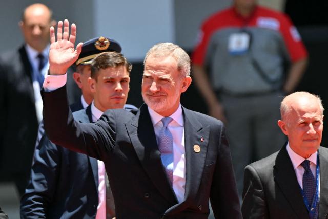 Spain's King Felipe VI waves as he arrives for the inauguration ceremony of Costa Rica's president-elect Laura Fernandez at the National Stadium in San Jose on May 8, 2026. (Photo by MARTIN BERNETTI / AFP)