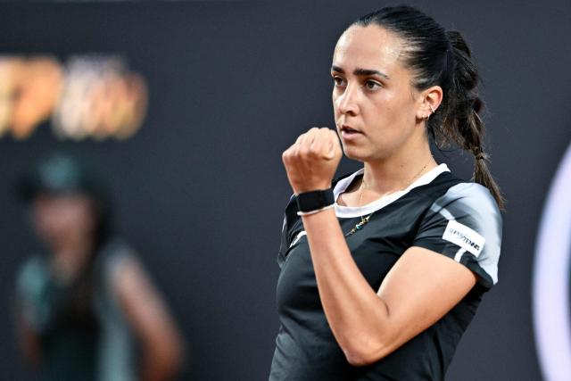 Italy's Noemi Basiletti celebrates a point against Ukraine's Elina Svitolina during their women's singles match of the WTA Rome Open tennis tournament at the Foro Italico in Rome on May 8, 2026. (Photo by Tiziana FABI / AFP)