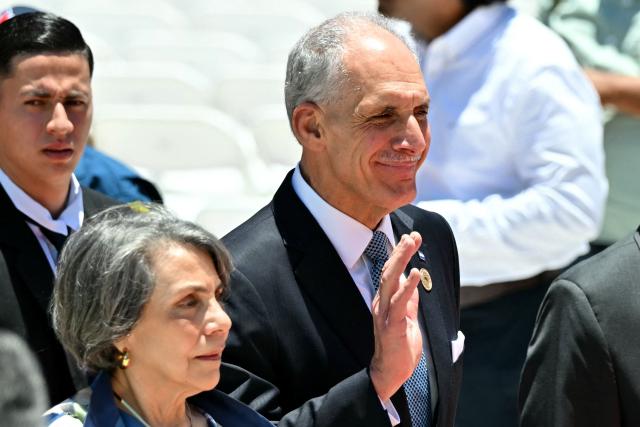 Honduras' President Nasry Asfura waves as he arrives for the inauguration ceremony of Costa Rica's president-elect Laura Fernandez, at the National Stadium in San Jose, on May 8, 2026. Costa Rican political scientist Laura Fernandez will be inaugurated as president on May 8, 2026, the latest right-winger to win power in Latin America on a promise to combat drug-related violence. (Photo by MARTIN BERNETTI / AFP)