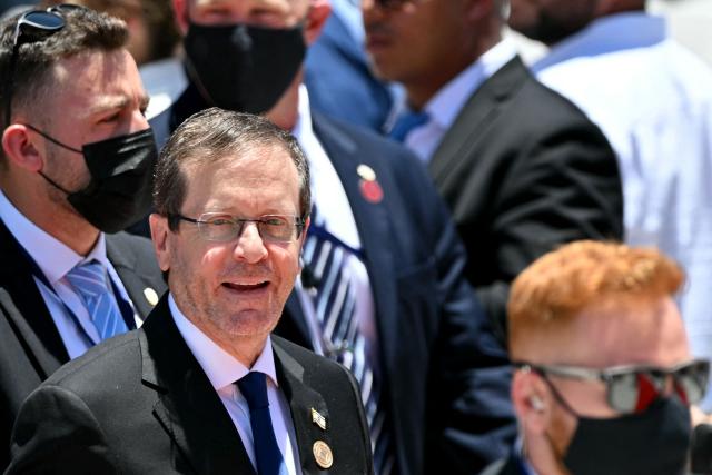 Israel's President Isaac Herzog gestures as he arrives for the inauguration ceremony of Costa Rica's president-elect Laura Fernandez, at the National Stadium in San Jose, on May 8, 2026. Costa Rican political scientist Laura Fernandez will be inaugurated as president on May 8, 2026, the latest right-winger to win power in Latin America on a promise to combat drug-related violence. (Photo by MARTIN BERNETTI / AFP)
