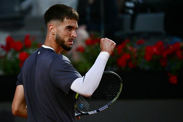 Croatia's Dino Prizmic reacts as he plays against Serbia's Novak Djokovic during their men's singles match of the WTA Rome Open tennis tournament at the Foro Italico in Rome on May 8, 2026. (Photo by Filippo MONTEFORTE / AFP)
