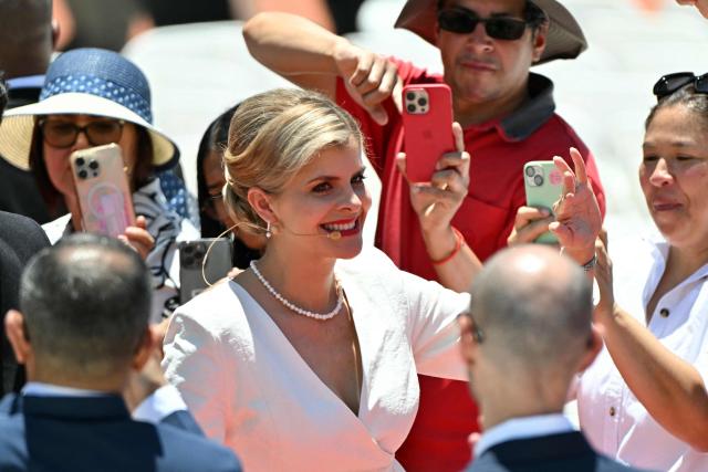 Costa Rica's incoming President Laura Fernandez waves as she arrives for her inauguration ceremony at the National Stadium in San Jose, on May 8, 2026. Costa Rican political scientist Laura Fernandez will be inaugurated as president, the latest right-winger to win power in Latin America on a promise to combat drug-related violence. (Photo by MARTIN BERNETTI / AFP)