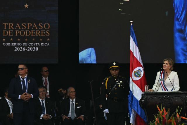 Costa Rica's new President Laura Fernandez (R) speaks during her inauguration ceremony at the National Stadium in San Jose, on May 8, 2026. Costa Rican political scientist Laura Fernandez will be inaugurated as president, the latest right-winger to win power in Latin America on a promise to combat drug-related violence. (Photo by MARTIN BERNETTI / AFP)