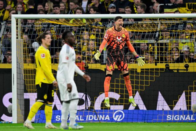 Dortmund's Swiss goalkeeper #01 Gregor Kobel jumps during the German first division Bundesliga football match between BVB Borussia Dortmund and Eintracht Frankfurt in Dortmund, western Germany on May 8, 2026. (Photo by INA FASSBENDER / AFP) / DFL REGULATIONS PROHIBIT ANY USE OF PHOTOGRAPHS AS IMAGE SEQUENCES AND/OR QUASI-VIDEO