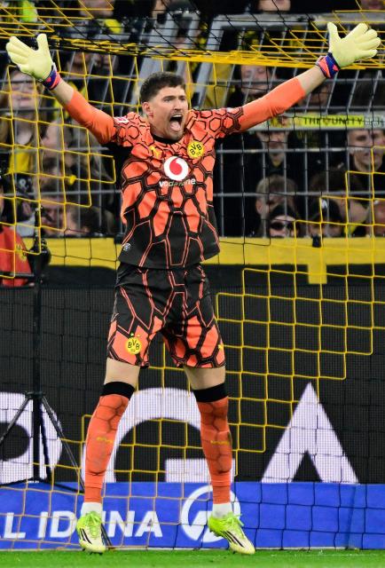 Dortmund's Swiss goalkeeper #01 Gregor Kobel reacts during the German first division Bundesliga football match between BVB Borussia Dortmund and Eintracht Frankfurt in Dortmund, western Germany on May 8, 2026. (Photo by INA FASSBENDER / AFP) / DFL REGULATIONS PROHIBIT ANY USE OF PHOTOGRAPHS AS IMAGE SEQUENCES AND/OR QUASI-VIDEO