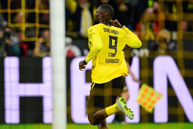 Dortmund's Guinean forward #09 Serhou Guirassy celebrates scoring the 1-1 goal during the German first division Bundesliga football match between BVB Borussia Dortmund and Eintracht Frankfurt in Dortmund, western Germany on May 8, 2026. (Photo by INA FASSBENDER / AFP) / DFL REGULATIONS PROHIBIT ANY USE OF PHOTOGRAPHS AS IMAGE SEQUENCES AND/OR QUASI-VIDEO