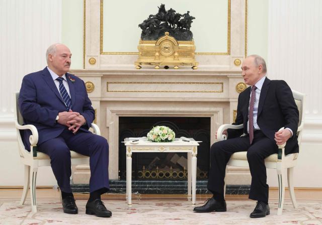 Russian President Vladimir Putin and Belarusian President Alexander Lukashenko attend a meeting at the Kremlin in Moscow on May 8, 2026. (Photo by Ramil Sitdikov / POOL / AFP)