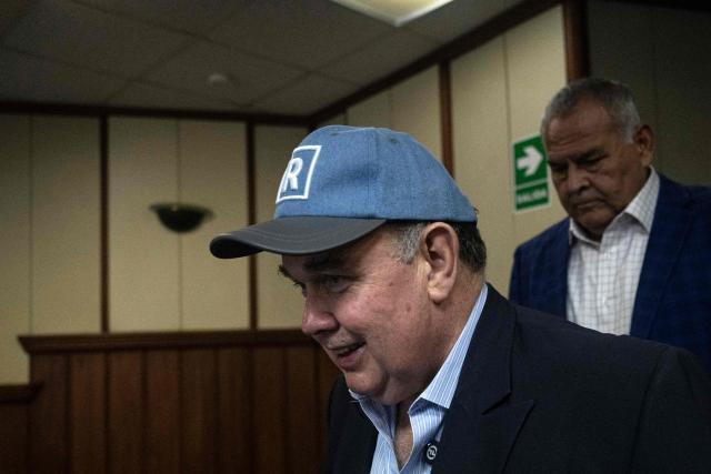 Peru's presidential candidate Rafael Lopez Aliaga of the Renovacion Popular party arrives for a press conference for the Peruvian Foreign Press Association at his campaign headquarters in Lima on May 8, 2026. (Photo by ERNESTO BENAVIDES / AFP)