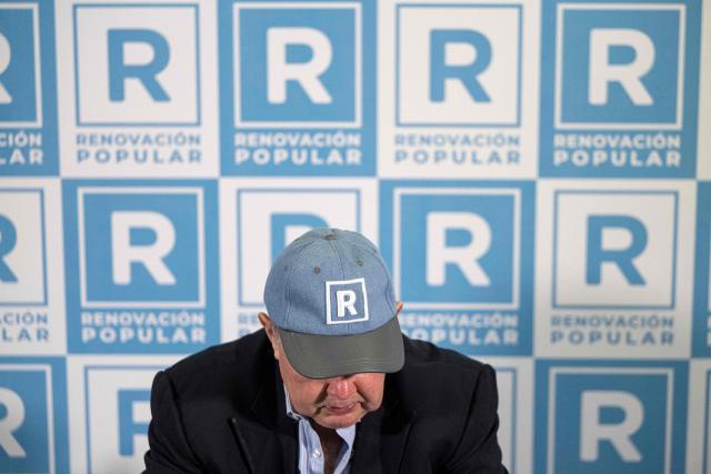 Peru's presidential candidate Rafael Lopez Aliaga of the Renovacion Popular party gives a press conference for the Peruvian Foreign Press Association at his campaign headquarters in Lima on May 8, 2026. (Photo by ERNESTO BENAVIDES / AFP)