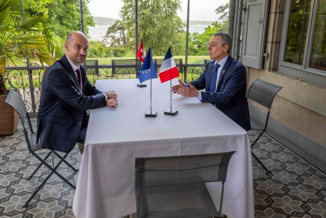 Switzerland's Foreign Affairs Minister and Federal councillor Ignazio Cassis (R) speaks with France's Foreign Affairs Minister Jean-Noel Barrot during their bilateral meeting between Switzerland and France of the G7 countries in preparation of the upcoming June 2026 Evian summit of heads of State and government, in Geneva on May 8, 2026. (Photo by MARTIAL TREZZINI / POOL / AFP)