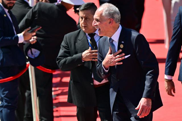 Honduras' President Nasry Asfura leaves after the inauguration ceremony of Costa Rica's president-elect Laura Fernandez, at the National Stadium in San Jose, on May 8, 2026. (Photo by MARTIN BERNETTI / AFP)