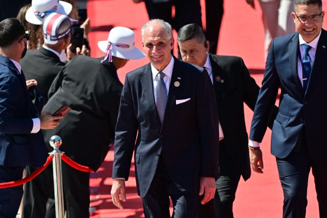 Honduras' President Nasry Asfura arrives for the inauguration ceremony of Costa Rica's president-elect Laura Fernandez, at the National Stadium in San Jose, on May 8, 2026. (Photo by MARTIN BERNETTI / AFP)