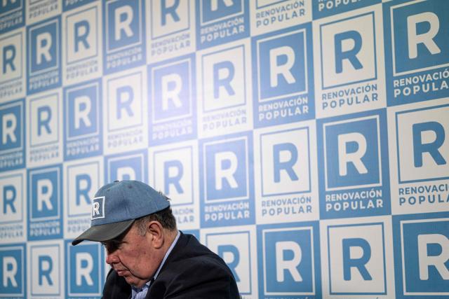 Peru's presidential candidate Rafael Lopez Aliaga of the Renovacion Popular party gives a press conference for the Peruvian Foreign Press Association at his campaign headquarters in Lima on May 8, 2026. (Photo by ERNESTO BENAVIDES / AFP)