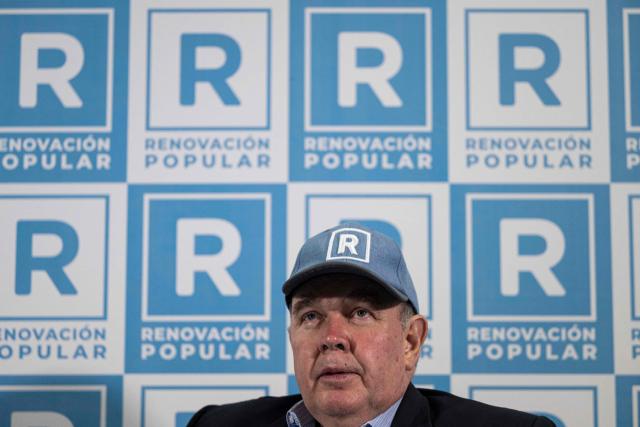 Peru's presidential candidate Rafael Lopez Aliaga of the Renovacion Popular party gives a press conference for the Peruvian Foreign Press Association at his campaign headquarters in Lima on May 8, 2026. (Photo by ERNESTO BENAVIDES / AFP)