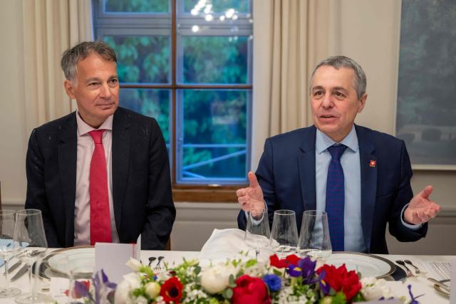 Switzerland's Foreign Affairs Minister and Federal councillor Ignazio Cassis (R) and Switzerland ambassador to Mexico and Federal Council Delegate for the G7 Summit Alain Gaschen (L) attend a dinner during a bilateral meeting between Switzerland and France of the G7 countries in preparation of the upcoming June 2026 Evian summit of heads of State and government, in Geneva on May 8, 2026. (Photo by MARTIAL TREZZINI / POOL / AFP)