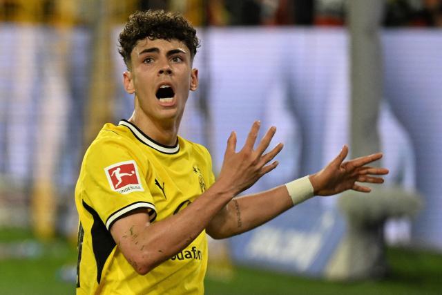 Dortmund's Italian forward #40 Samuele Inacio celebrates scoring the 3-1 goal during the German first division Bundesliga football match between BVB Borussia Dortmund and Eintracht Frankfurt in Dortmund, western Germany on May 8, 2026. (Photo by INA FASSBENDER / AFP) / DFL REGULATIONS PROHIBIT ANY USE OF PHOTOGRAPHS AS IMAGE SEQUENCES AND/OR QUASI-VIDEO  ALTERNATIVE CROP