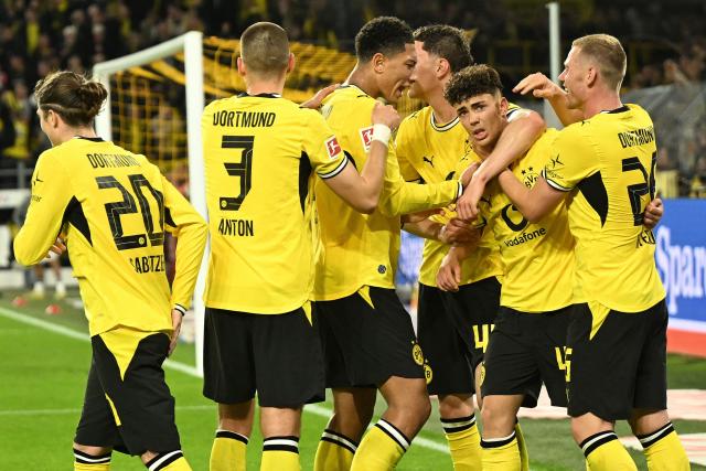 Dortmund's Italian forward #40 Samuele Inacio (2nd R) celebrates scoring the 3-1 goal with his teammates during the German first division Bundesliga football match between BVB Borussia Dortmund and Eintracht Frankfurt in Dortmund, western Germany on May 8, 2026. (Photo by INA FASSBENDER / AFP) / DFL REGULATIONS PROHIBIT ANY USE OF PHOTOGRAPHS AS IMAGE SEQUENCES AND/OR QUASI-VIDEO  ALTERNATIVE CROP