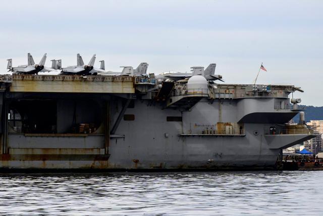 The USS Nimitz (CVN-68) aircraft carrier is seen in Guanabara Bay in Rio de Janeiro, Brazil, on May 8, 2026. (Photo by Pablo PORCIUNCULA / AFP)