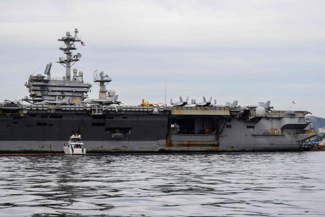 The USS Nimitz (CVN-68) aircraft carrier is seen in Guanabara Bay in Rio de Janeiro, Brazil, on May 8, 2026. (Photo by Pablo PORCIUNCULA / AFP)