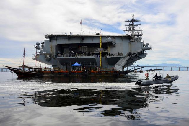 The USS Nimitz (CVN-68) aircraft carrier is seen in Guanabara Bay in Rio de Janeiro, Brazil, on May 8, 2026. (Photo by Pablo PORCIUNCULA / AFP)