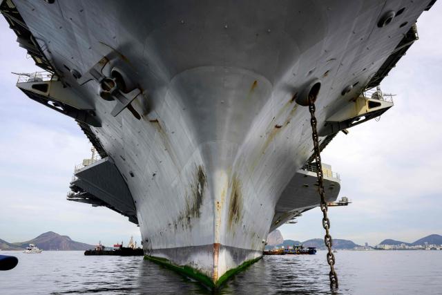 The USS Nimitz (CVN-68) aircraft carrier is seen in Guanabara Bay in Rio de Janeiro, Brazil, on May 8, 2026. (Photo by Pablo PORCIUNCULA / AFP)