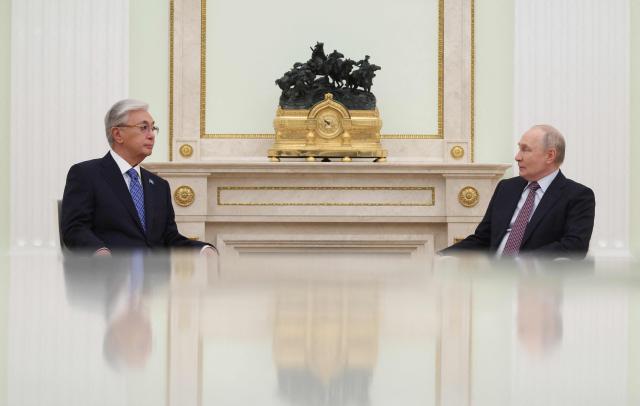 Russian President Vladimir Putin and Kazakh President Kassym-Jomart Tokayev attend a meeting at the Kremlin in Moscow on May 8, 2026. (Photo by Ramil Sitdikov / POOL / AFP)
