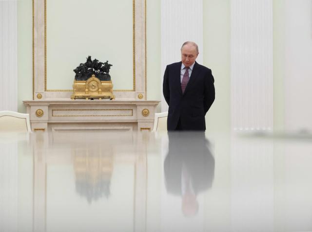Russian President Vladimir Putin attends a meeting with Uzbek President at the Kremlin in Moscow on May 8, 2026. (Photo by Ramil Sitdikov / POOL / AFP)