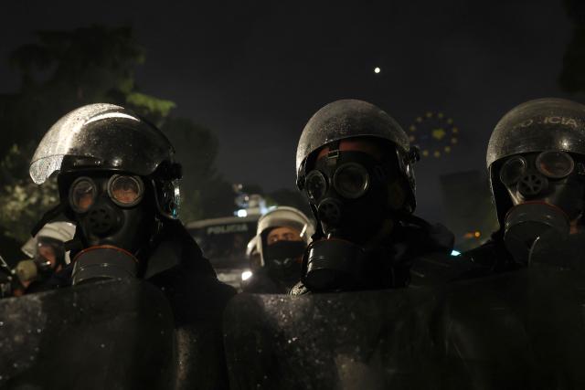 Albanian riot police stand by during an anti-government protest in Tirana on May 8, 2026. (Photo by Adnan Beci / AFP)