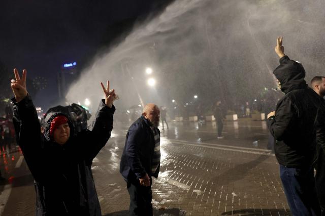 Demonstrators clash with Albanian riot police during an anti-government protest in Tirana on May 8, 2026. (Photo by Adnan Beci / AFP)