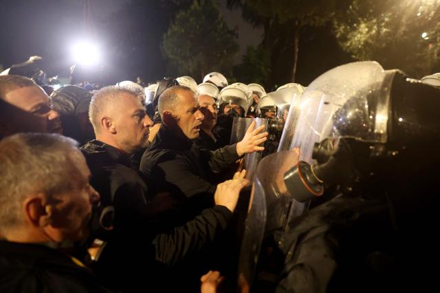 Demonstrators clash with Albanian riot police officers during an anti-government protest in Tirana on May 8, 2026. (Photo by Adnan Beci / AFP)
