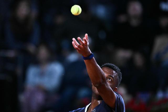 France's Giovanni Mpetshi Perricard serves against Italy's Lorenzo Musetti during the men's singles match of the WTA Rome Open tennis tournament at the Foro Italico in Rome on May 8, 2026. (Photo by Tiziana FABI / AFP)