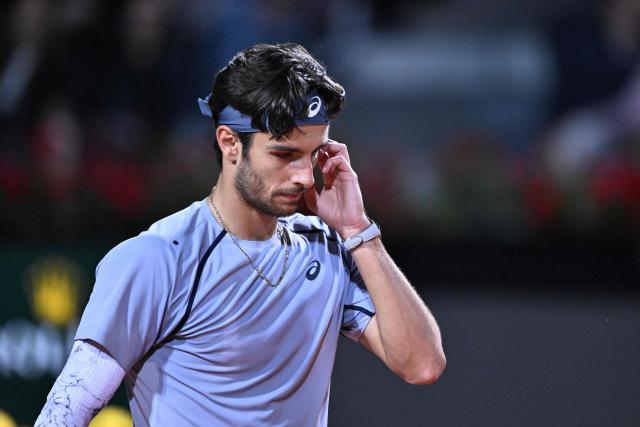 Italy's Lorenzo Musetti gestures during the men's singles match of the Rome Masters 1000 tennis tournament against France's Giovanni Mpetshi Perricard at the Foro Italico in Rome on May 8, 2026. (Photo by Tiziana FABI / AFP)