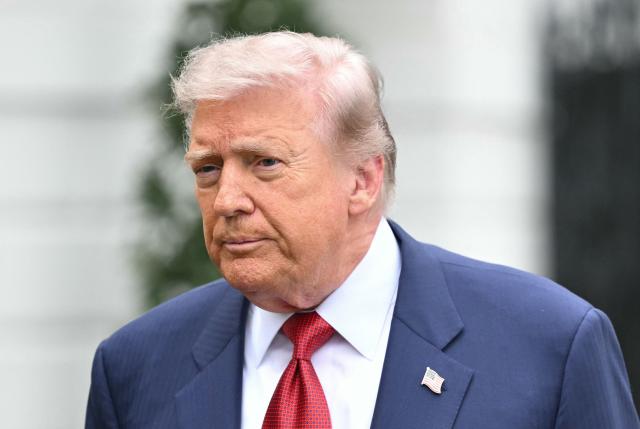 US President Donald Trump makes his way to board Marine One before departing from the South Lawn of the White House in Washington, DC on May 8, 2026. Trump is traveling to Sterling, Virginia, where he will participate in a LIV Golf dinner. (Photo by Mandel NGAN / AFP)