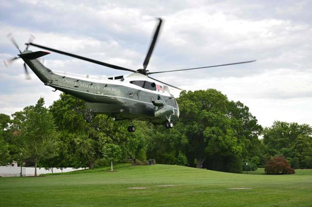 Marine One with US President Donald Trump on board takes off from the South Lawn of the White House in Washington, DC, on May 8, 2026. Trump is traveling to Sterling, Virginia, where he will participate in a LIV Golf dinner. (Photo by Mandel NGAN / AFP)