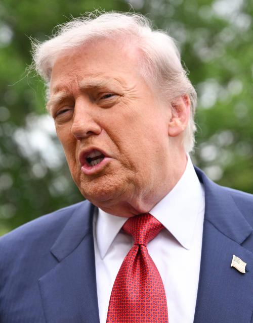 US President Donald Trump speaks to journalists as he makes his way to board Marine One before departing from the South Lawn of the White House in Washington, DC on May 8, 2026. Trump is traveling to Sterling, Virginia, where he will participate in a LIV Golf dinner. (Photo by Mandel NGAN / AFP)