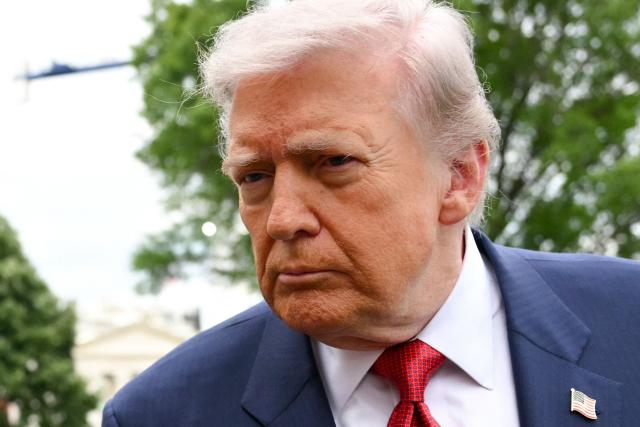 US President Donald Trump speaks to journalists as he makes his way to board Marine One before departing from the South Lawn of the White House in Washington, DC on May 8, 2026. Trump is traveling to Sterling, Virginia, where he will participate in a LIV Golf dinner. (Photo by Mandel NGAN / AFP)