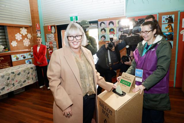 Independent candidate Michelle Milthorpe (L) casts her vote at a polling station during the Farrer By-Election in Jindera, New South Wales on May 9, 2026. (Photo by HILARY WARDHAUGH / AFP)