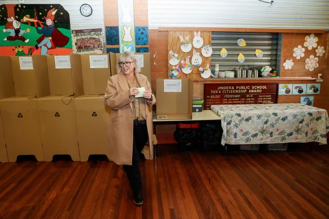 Independent candidate Michelle Milthorpe prepares to cast her vote at a polling station during the Farrer By-Election in Jindera, New South Wales on May 9, 2026. (Photo by HILARY WARDHAUGH / AFP)