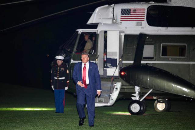 US President Donald Trump walks across the South Lawn upon returning to the White House in Washington, DC, on May 8, 2026. Trump is returning to the White House after attending a LIV Golf dinner in Sterling, Virginia. (Photo by Mandel NGAN / AFP)