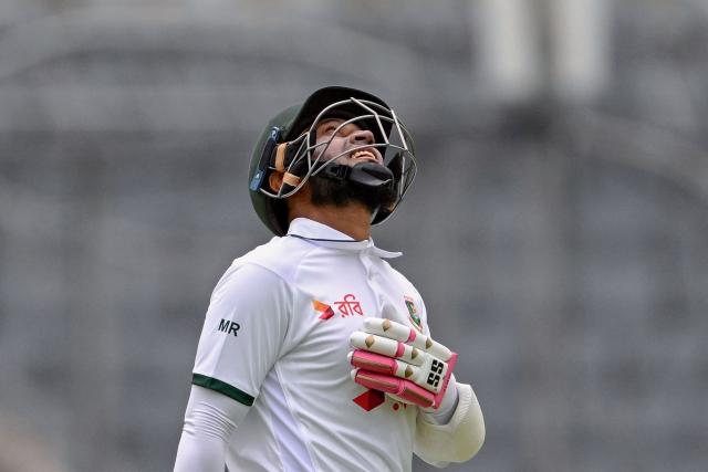 Bangladesh's Mushfiqur Rahim reacts after scoring a half-century (50 runs) during the second day of the first test cricket match between Bangladesh and Pakistan at the Sher-e-Bangla National Stadium in Mirpur on May 9, 2026. (Photo by Munir UZ ZAMAN / AFP)