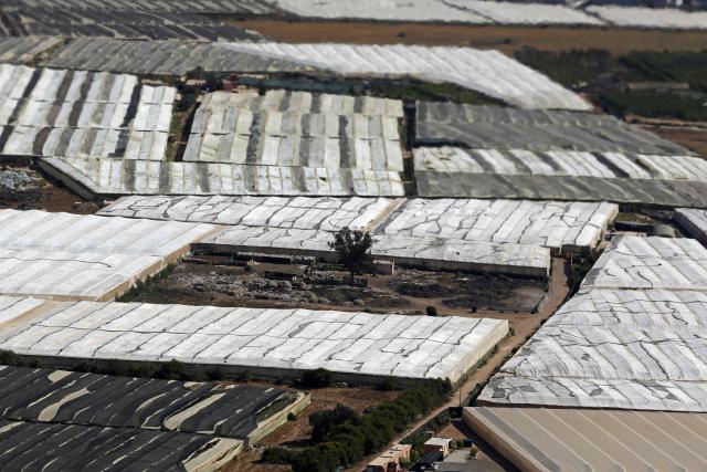 This aerial photograph shows patches of greenhouse farming in Agadir on May 8, 2026. (Photo by Abdel Majid BZIOUAT / AFP)