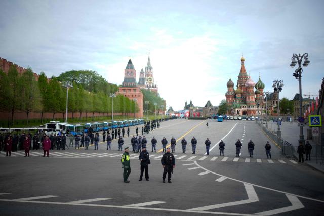 Police officers guard at Vasilevsky Spusk square before the Victory Day military parade in central Moscow on May 9, 2026. Russia celebrates the 81st anniversary of the Soviet Union's victory over Nazi Germany in World War Two (WWII). (Photo by Pavel Bednyakov / POOL / AFP)