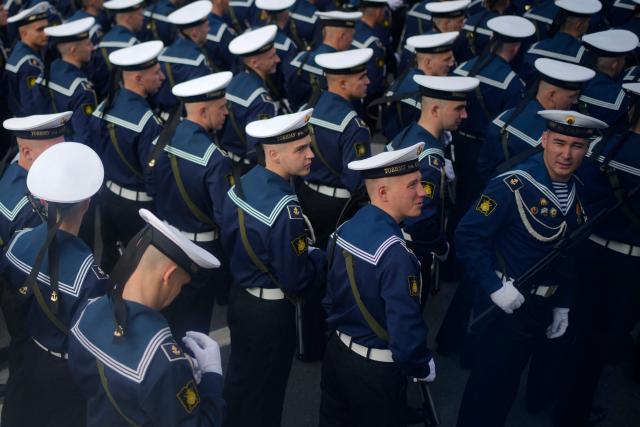 Russian servicemen stand in a formation before the Victory Day military parade in central Moscow on May 9, 2026. Russia celebrates the 81st anniversary of the Soviet Union's victory over Nazi Germany in World War Two (WWII). (Photo by Pavel Bednyakov / POOL / AFP)