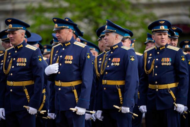 Russian servicemen stand in a formation before the Victory Day military parade at Red Square in central Moscow on May 9, 2026. Russia celebrates the 81st anniversary of the Soviet Union's victory over Nazi Germany in World War Two (WWII). (Photo by Pavel Bednyakov / POOL / AFP)